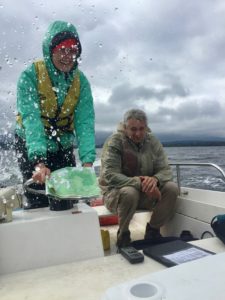 Photos of citizen science on a boat in a New Hampshire Lake