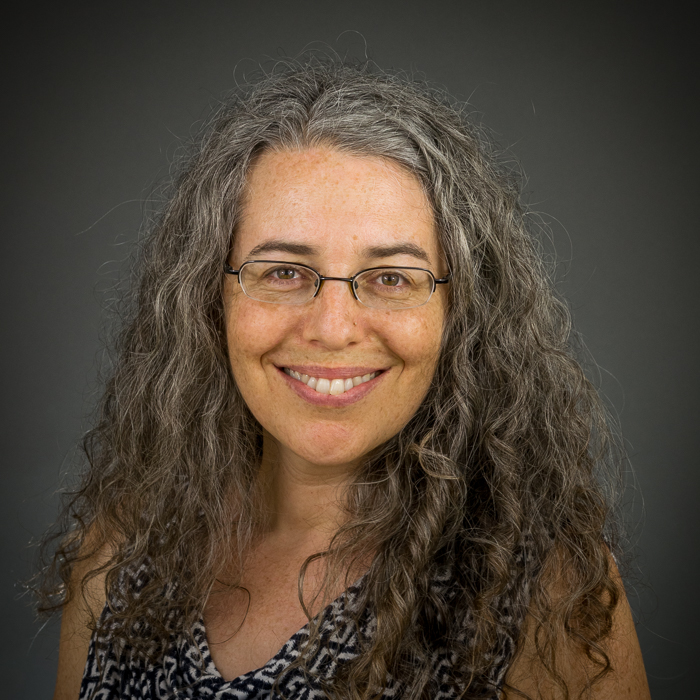 Caren Cooper photo against a grey background